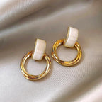 Opaline Halo Drop Earrings by WOLZI featuring white resin and gold-toned hoops