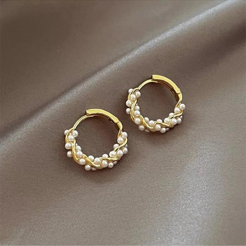 WOLZI Lumi Pearl Circle Stud Earrings in gold with white pearl accents