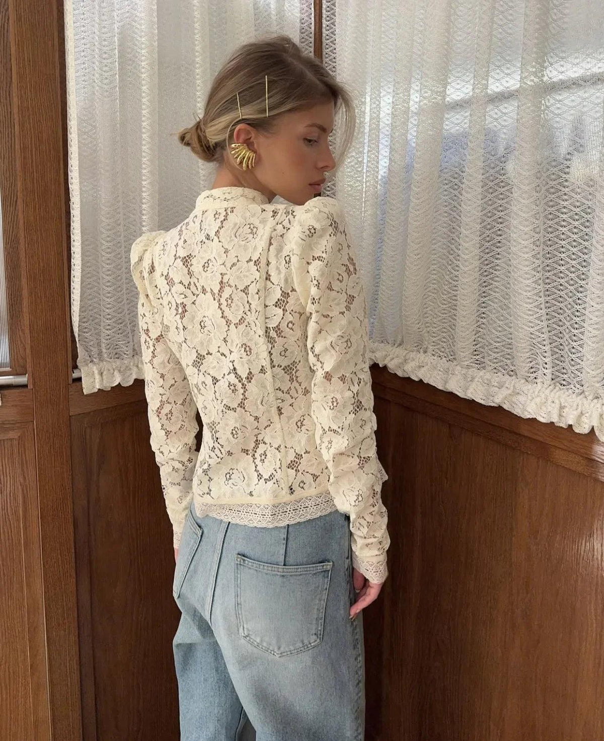 WOLZI Fontaine Lace Blouse in beige featuring long sleeves and intricate floral patterns.