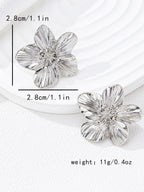 WOLZI Fleur Textured Flower Stud Earrings in silver-tone metal, 2.8cm diameter.