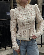 WOLZI Fontaine beige lace blouse with long sleeves and decorative front closures