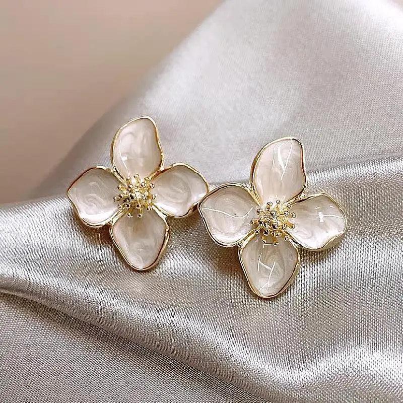 WOLZI Flora Glazed Flower Earrings in white enamel and gold tone