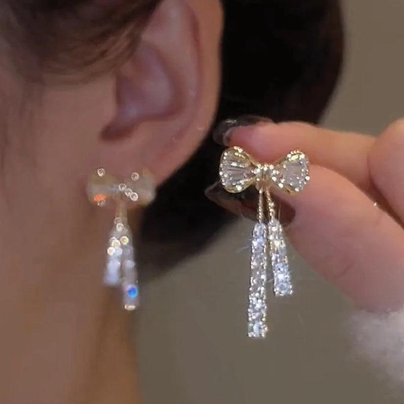 Elodie Crystal Bow Stud Earrings by WOLZI