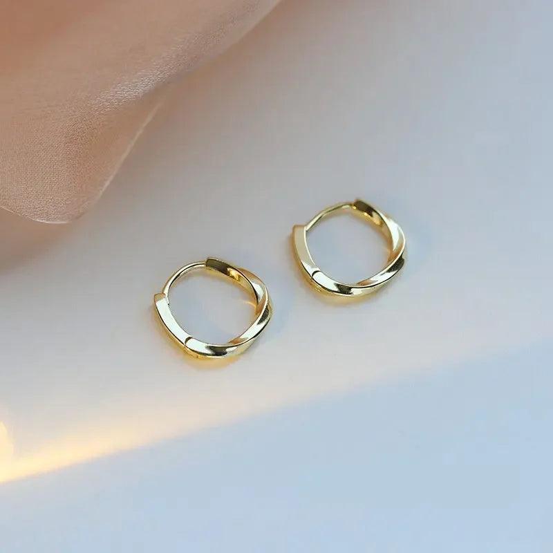Lumi Pearl Circle Stud Earrings in gold finish by WOLZI