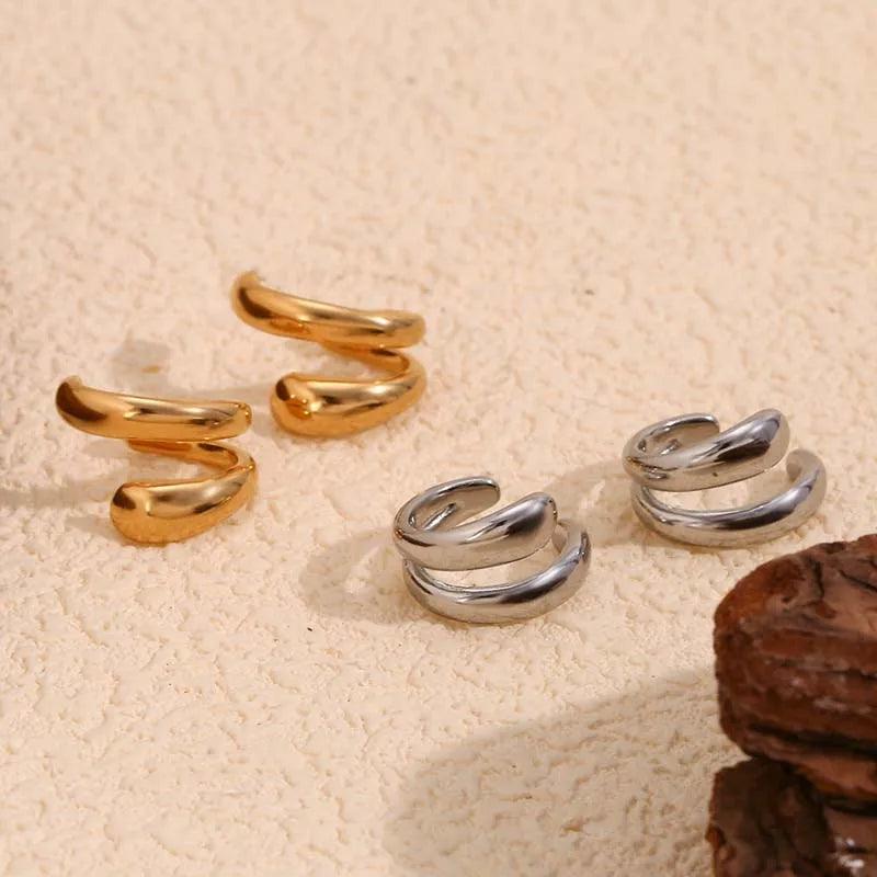 Aria Sculpted Ear Cuff by WOLZI in gold and silver tones